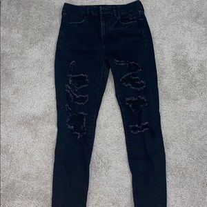 Black ripped American eagle skinny jeans. 8 short